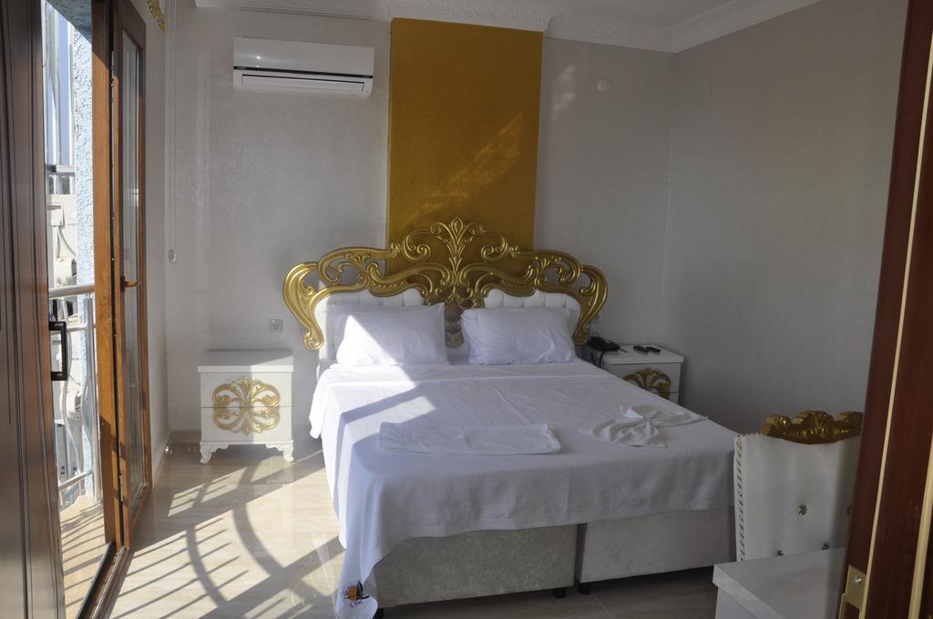 Alev Palace Otel Arsuz Habitación foto